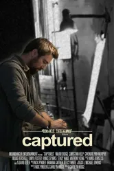 Captured 2015 постер