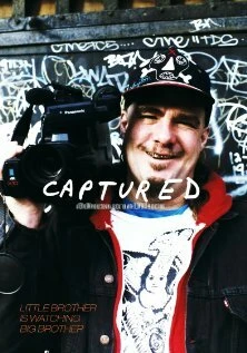 Постер Captured 2008